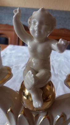 4869-candleholder-cherub-on-gold-ball-closeup