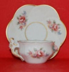 Tea cup and saucer roses pattern